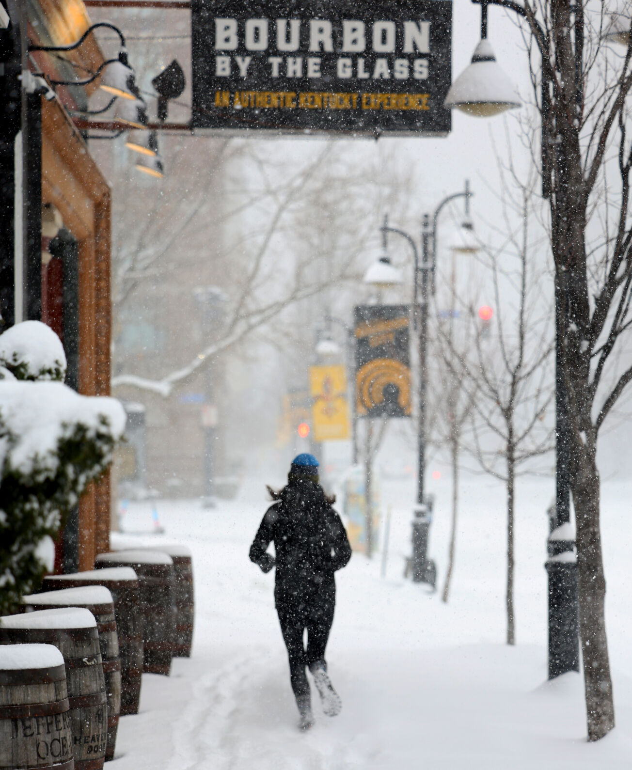 Woman runs down Main Street - Jan. 5, 2025.JPG